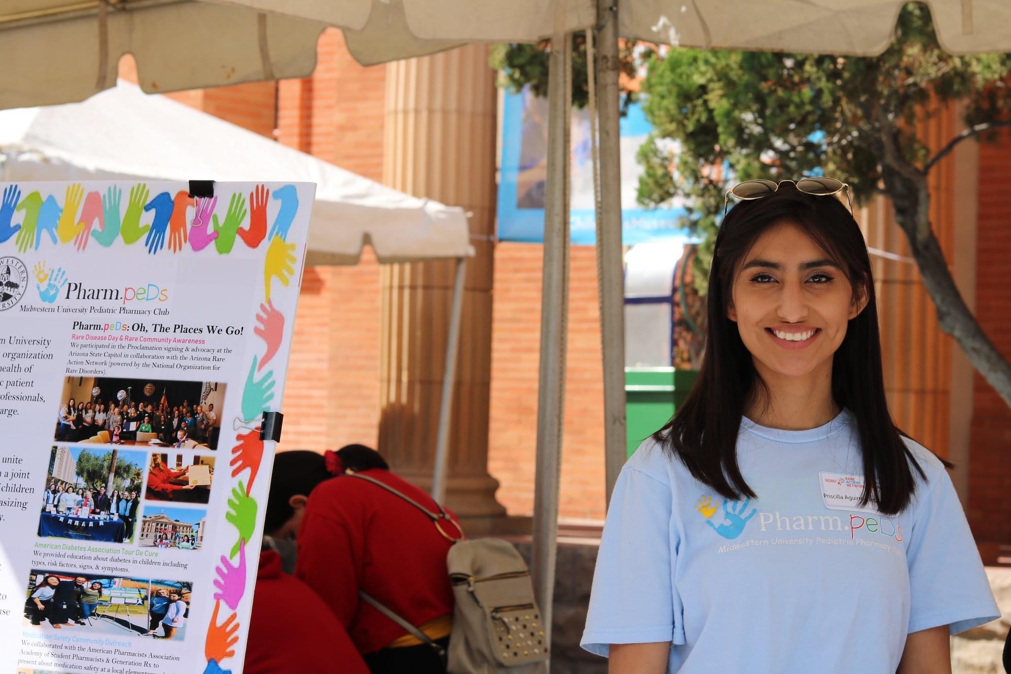 Pediatric Club member Priscilla Aguirre helps promote the cause.